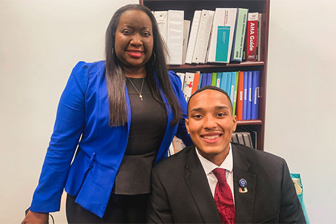  Mauricus Murdock pictured with Faith-Simone Hunte, corporate director of Employee Relations and Diversity, Equity, and Inclusion and supervisor of the internship program for Broward Health. 